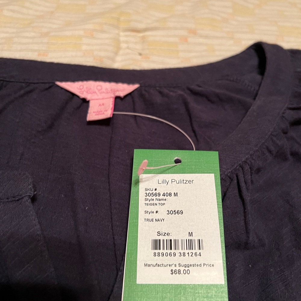 Lilly Pulitzer true navy top. Size medium.Flutter 3/4 sleeves with gold buttons.